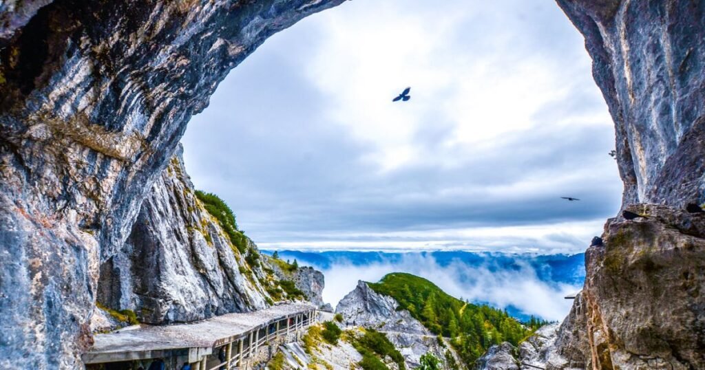 The breathtaking ice formations inside Eisriesenwelt, the largest ice cave in the world, are illuminated by natural light.