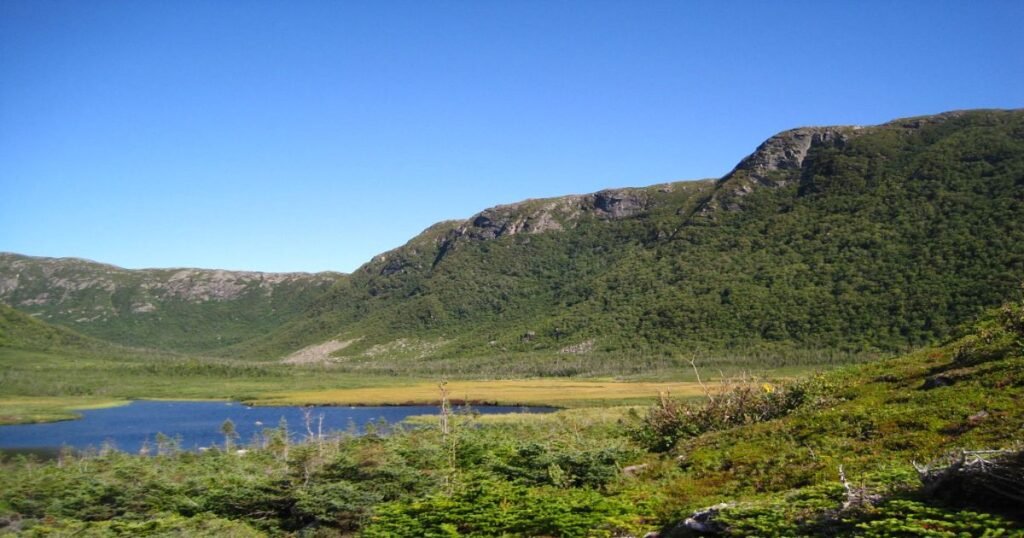 Stunning landscapes of Gros Morne National Park featuring rugged mountains and coastal scenery in Newfoundland.