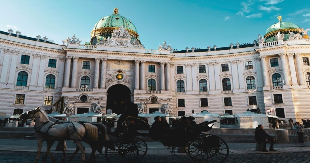 The grand Hofburg Palace with its majestic dome and stately architecture in Vienna’s historic center.