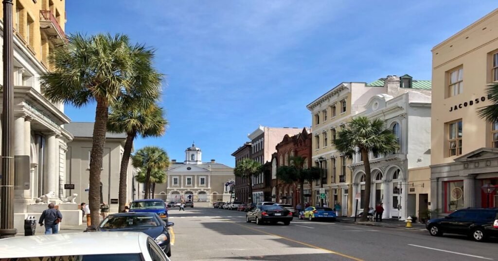 Historic buildings lining cobblestone streets in Charleston's French Quarter.