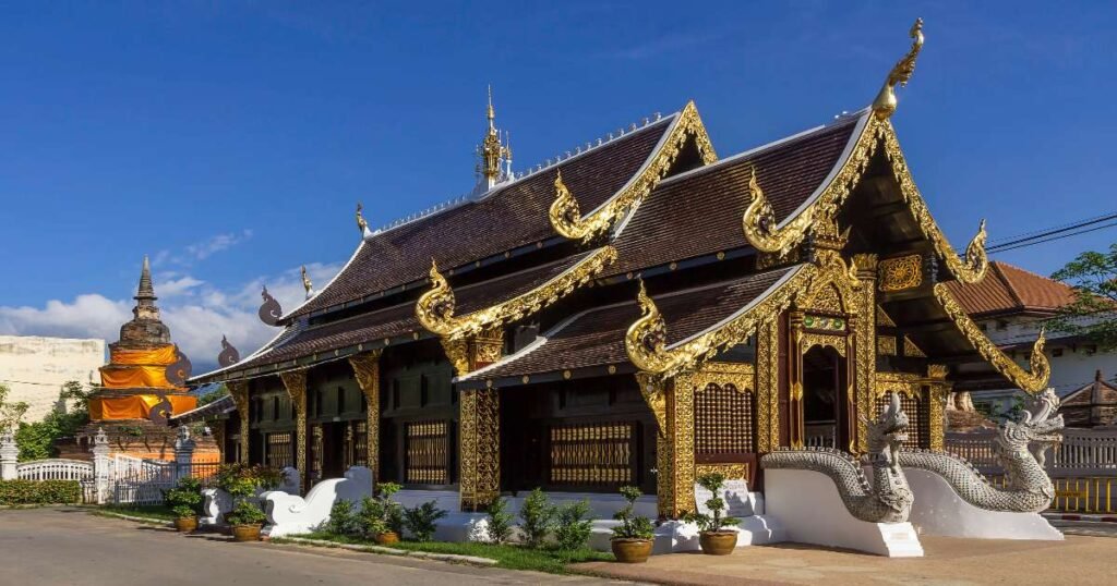 “Wat Phra Singh in Chiang Mai Old City, with its golden pagoda and traditional Lanna architecture.”