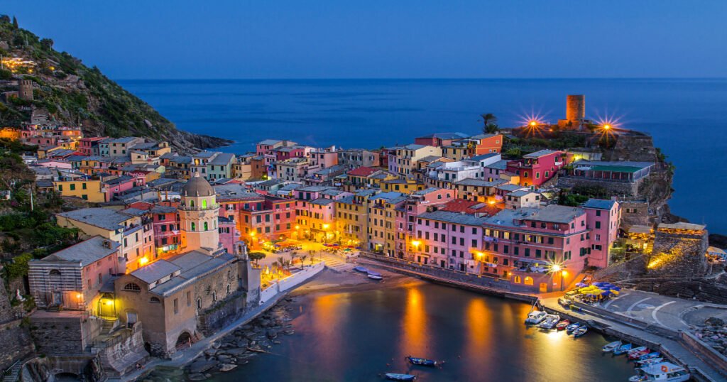 “Cinque Terre, colorful coastal villages nestled along the rugged cliffs of the Ligurian Sea.”