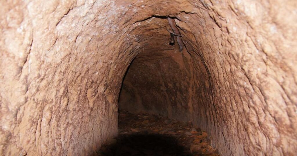 "Entrance to the Cu Chi Tunnels, a network of underground passageways used during the Vietnam War."