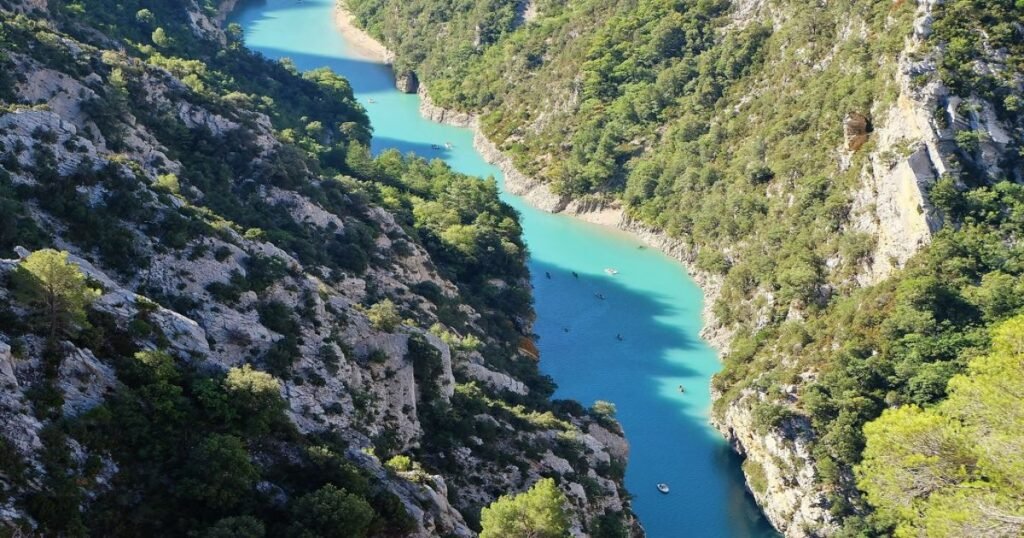 The turquoise waters of the Gorges du Verdon winding through the towering limestone cliffs.