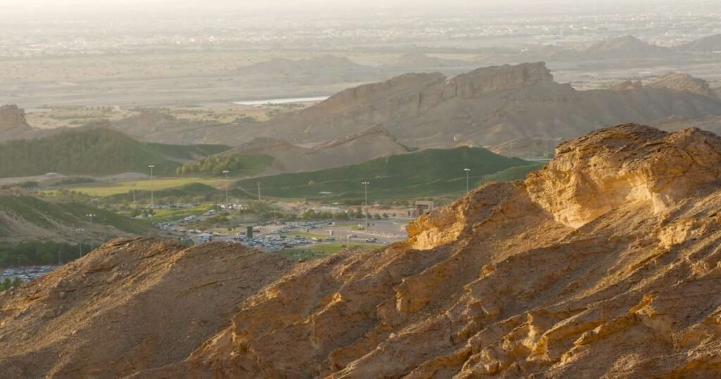 Sunset view from Jebel Hafeet overlooking Al Ain’s desert landscape.