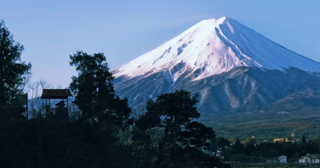 "Panoramic view of snow-capped Mount Fuji.