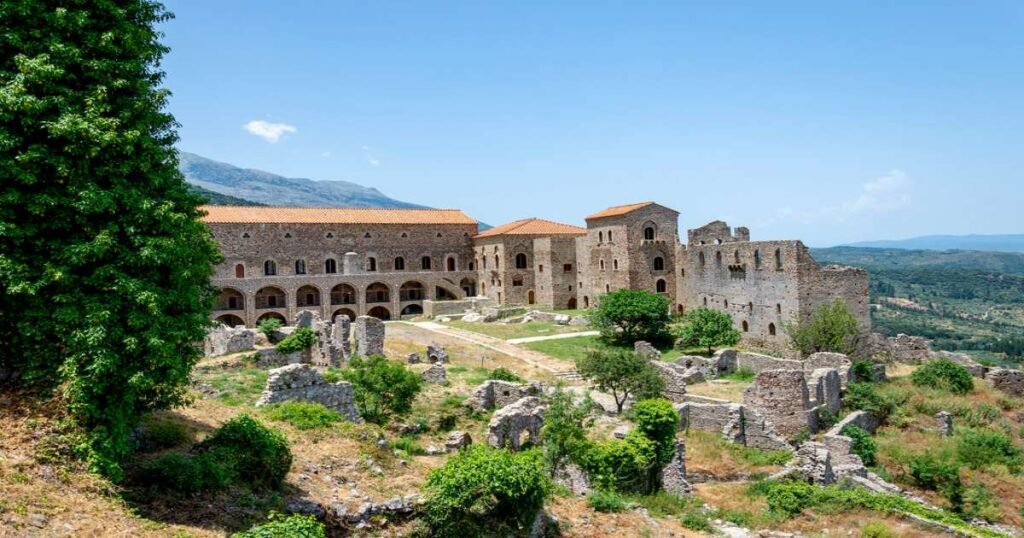 "Ruins of the medieval city of Mystras, with Byzantine churches and palaces in the Peloponnese region of Greece."