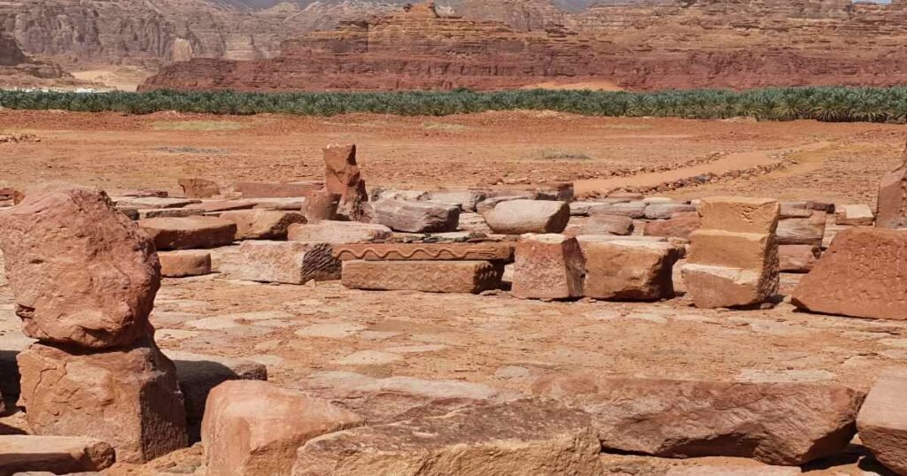 "The breathtaking rock formations of Al-Ula, highlighting the ancient tombs carved into the cliffs."