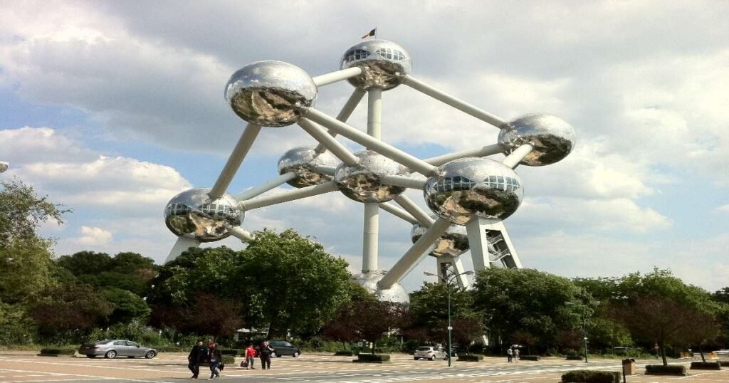 "The Atomium in Brussels, a futuristic structure resembling an iron crystal with interconnected spheres."