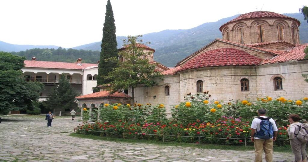 "The Bachkovo Monastery surrounded by the lush Rhodope Mountains."