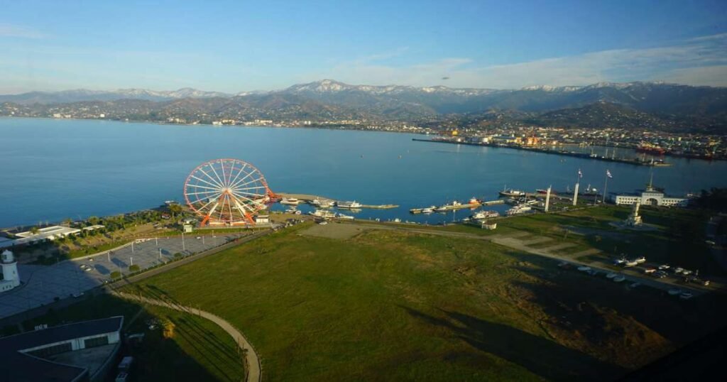 "Batumi Boulevard with a view of the Black Sea and modern buildings."