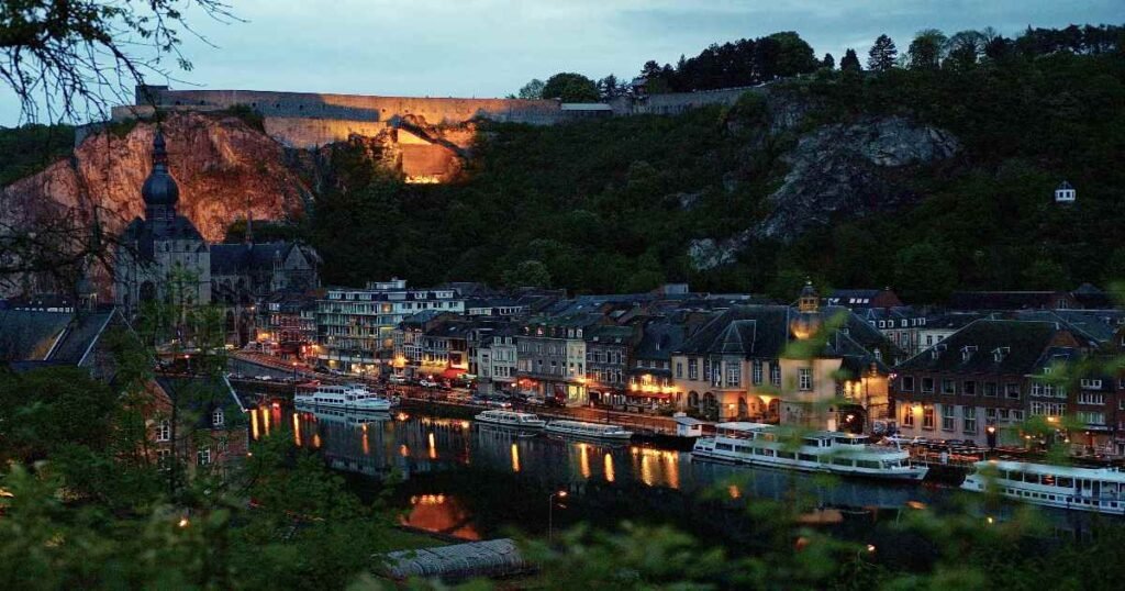  "The scenic Dinant Citadel overlooking the Meuse River and valley below."