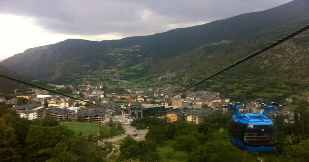 Funicamp Cable Car ascending mountain terrain with panoramic views in Andorra.