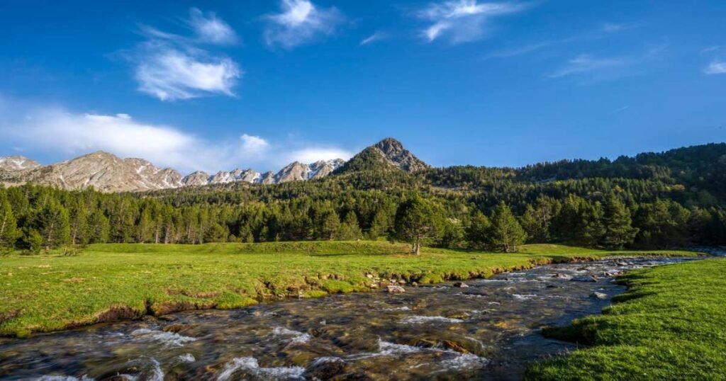 Lush green valleys and mountains of Madriu-Perafita-Claror Valley in Andorra.