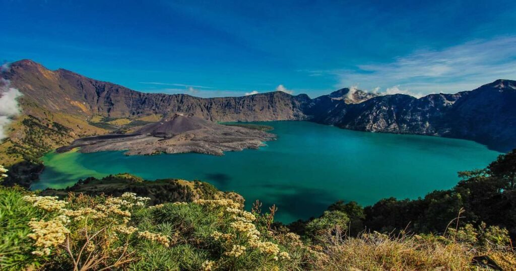 "The rocky trail to Mount Rinjani’s summit with the crater lake Segara Anak in view.”