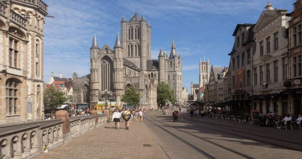 "The ornate St. Bavo's Cathedral in Ghent, with towering spires and intricate Gothic architecture."