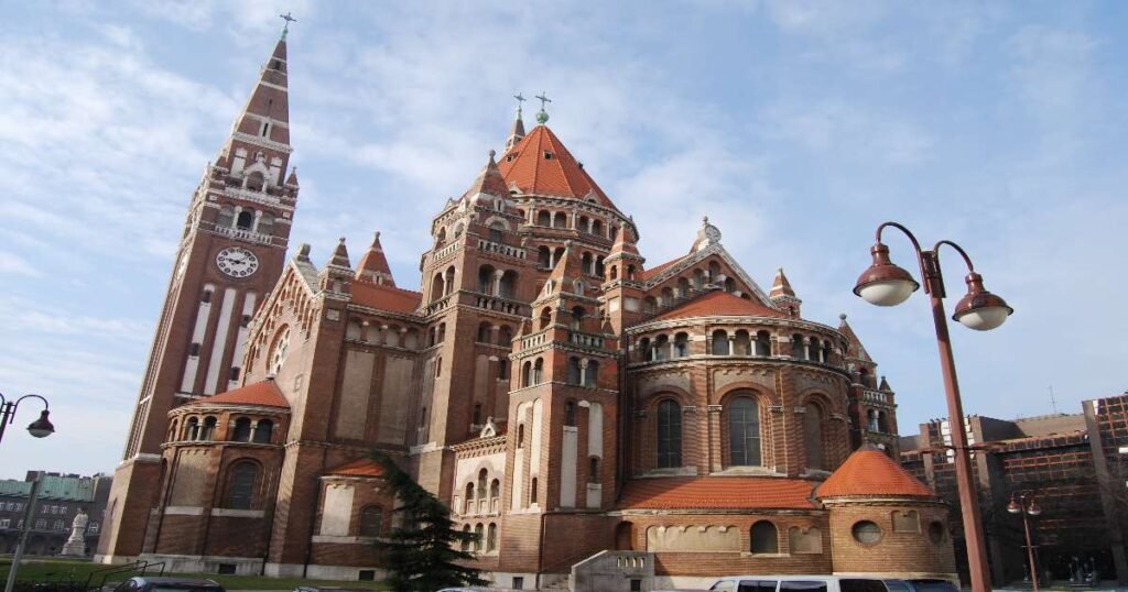 Grand Votive Church and Dóm Square in Szeged under a clear sky in Hungary.