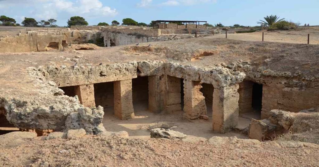 "Ancient rock-cut tombs with stone columns at the Tombs of the Kings, Paphos."