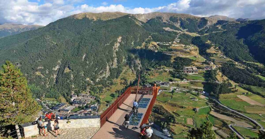 “Panoramic view of Andorran valleys from the Roc del Quer glass platform in Canillo.”