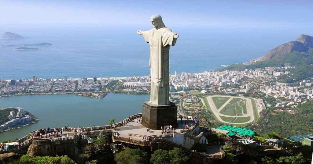 "The iconic Christ the Redeemer statue overlooking Rio de Janeiro with arms outstretched."