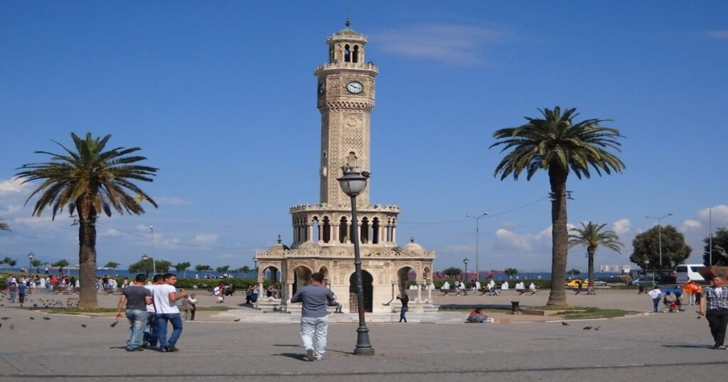 Izmir’s Clock Tower in Konak Square standing under the blue sky.