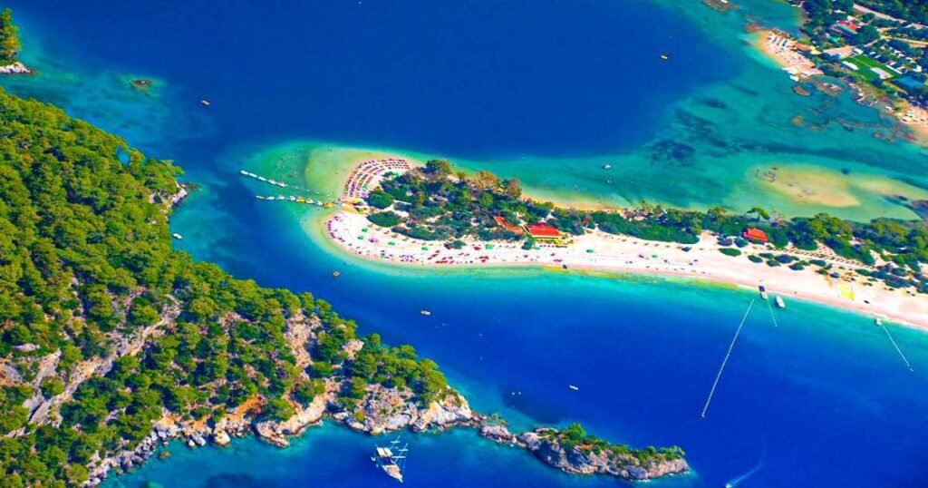 Aerial view of Ölüdeniz’s Blue Lagoon with its turquoise waters and lush surroundings.
