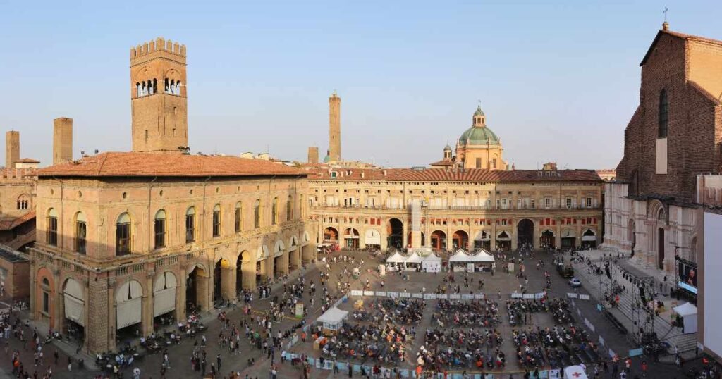Piazza Maggiore in Bologna with its historic buildings and vibrant atmosphere.
