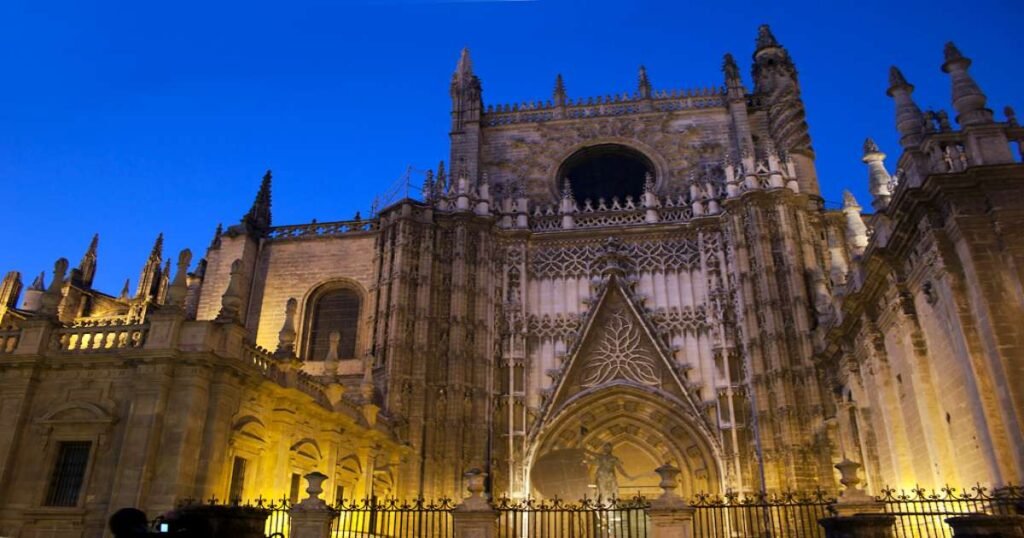Seville Cathedral and La Giralda illuminated at night
