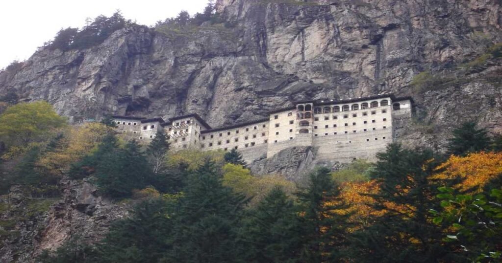 The Sumela Monastery perched on a cliff amid lush greenery in Trabzon.