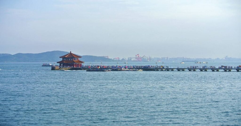 Zhanqiao Pier with its iconic pavilion extending into the sea in Qingdao.