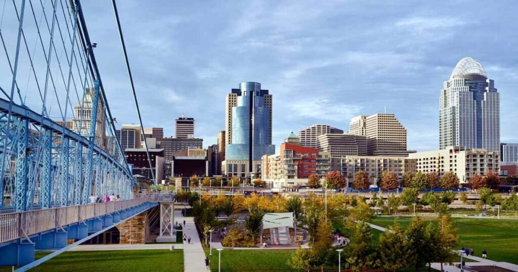 The stunning skyline of Cincinnati with the iconic John A. Roebling Suspension Bridge.