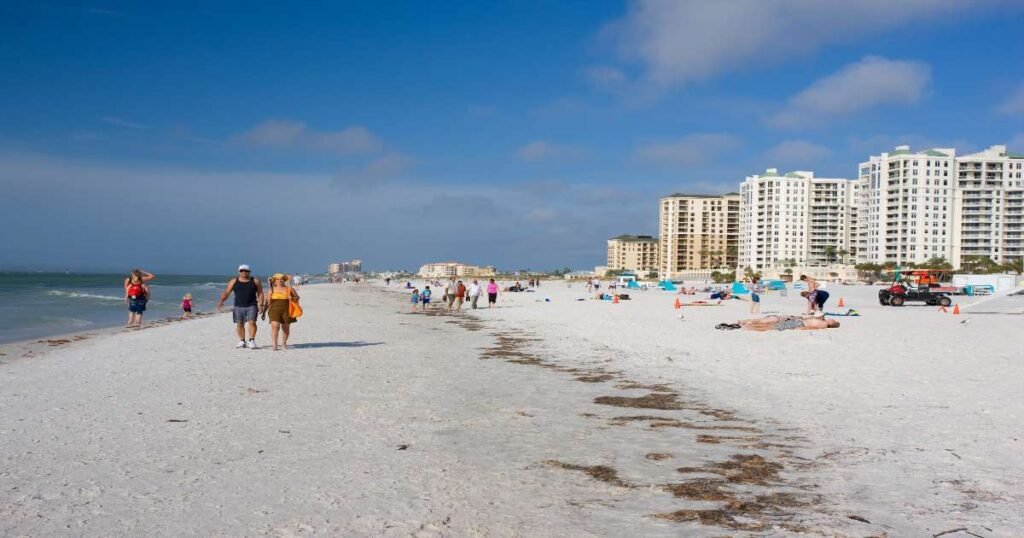 Clearwater Beach with its white sands and calm, turquoise waters.