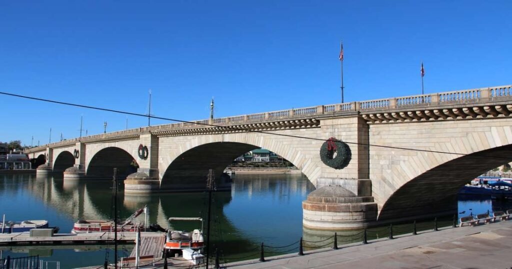 London Bridge spanning over the waters of Lake Havasu under a sunny sky.