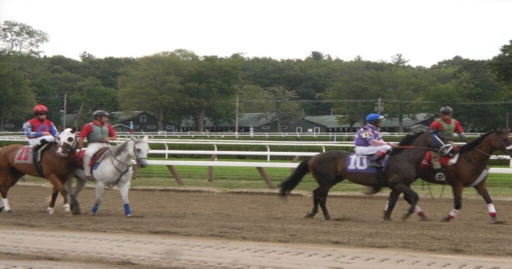 A vibrant summer day at the Saratoga Race Course with spectators enjoying the races.