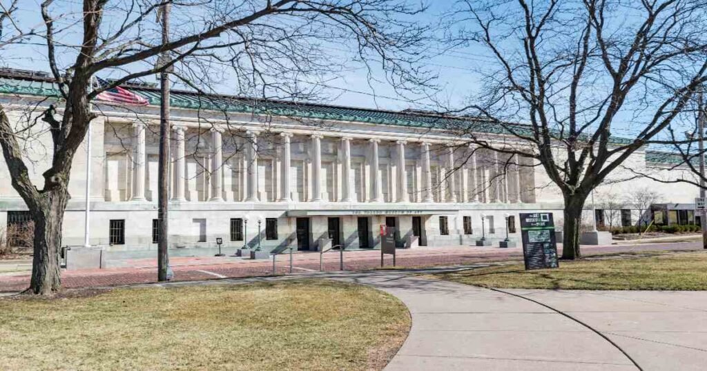 The majestic entrance of the Toledo Museum of Art with its classical architecture.