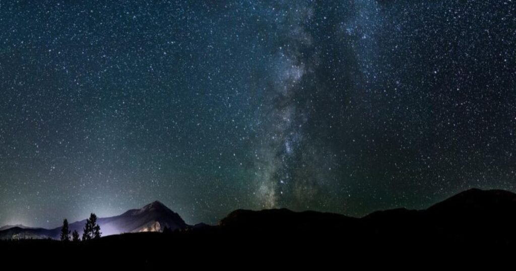 A star-filled sky over the desert landscape of Tonopah.