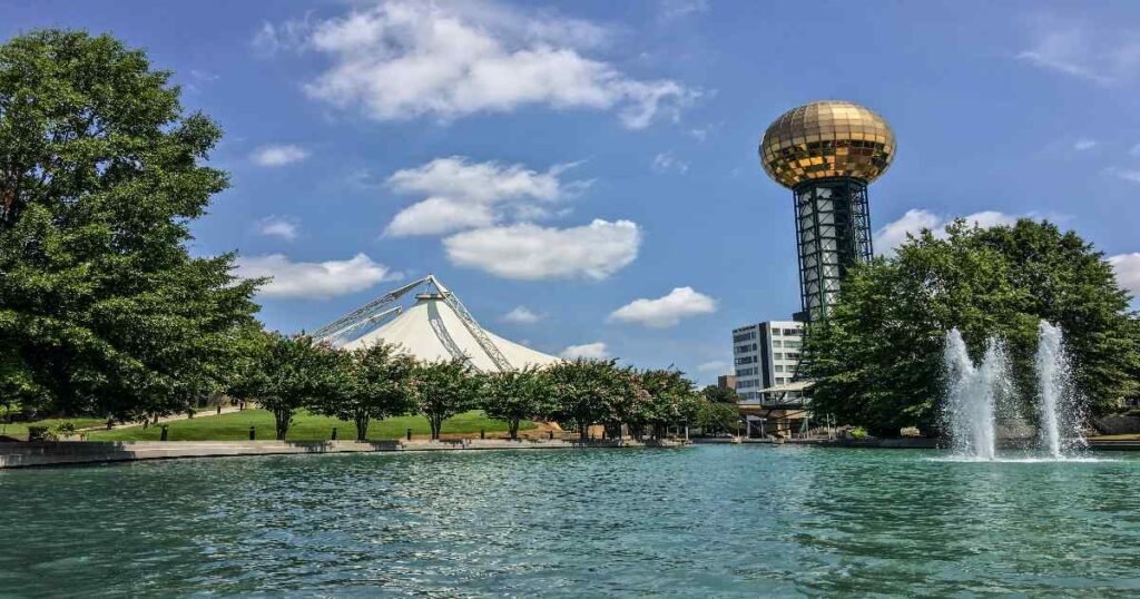 The Sunsphere at World’s Fair Park surrounded by lush greenery.