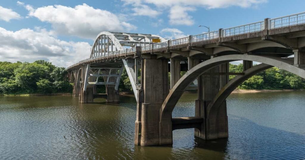The historic Edmund Pettus Bridge in Selma under a sunny sky.