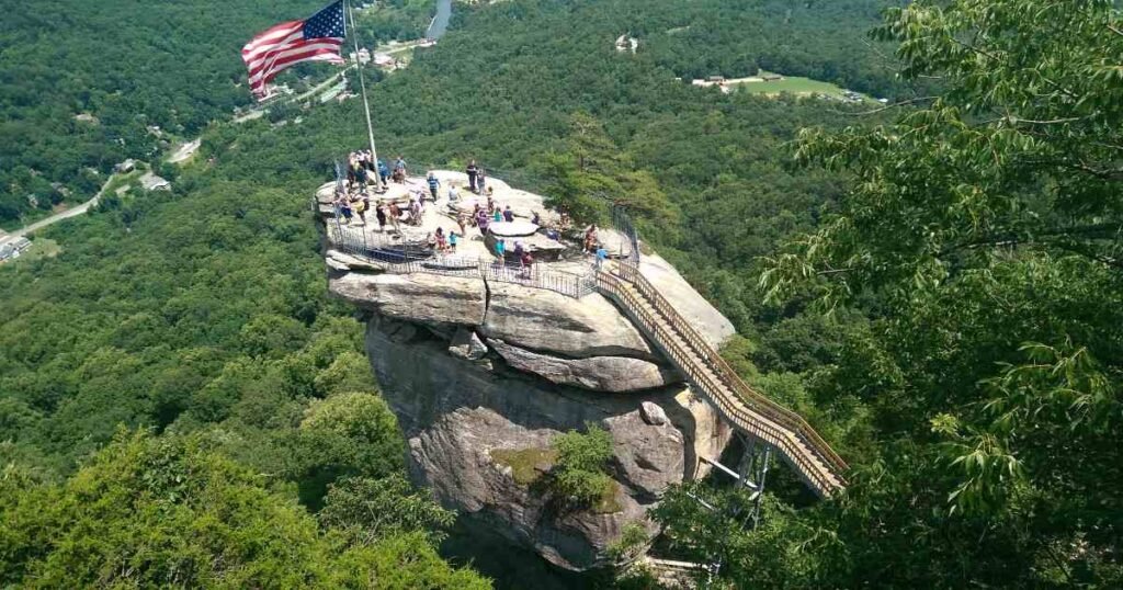 A breathtaking view from the top of Chimney Rock, overlooking the Blue Ridge Mountains.